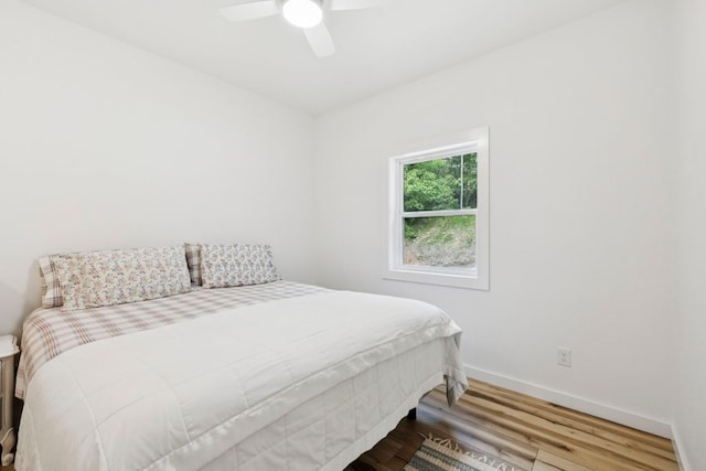 185 Little Elbow Mountain Rd, Lake Toxaway, NC 28747 - bedroom with wood finished floors and a ceiling fan