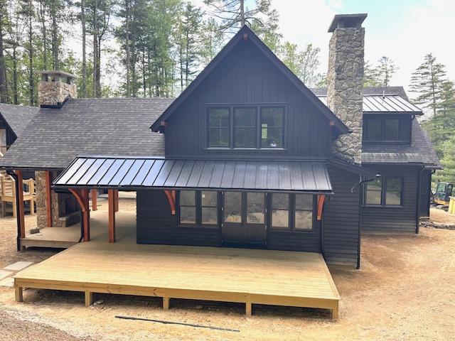 298 Pine Forest Rd, Sapphire, NC 28774 - rear view of property with a chimney, a standing seam roof, a metal roof, a shingled roof, and a deck