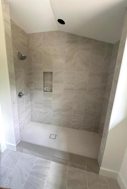 298 Pine Forest Rd, Sapphire, NC 28774 - full bath with vaulted ceiling and a tile shower