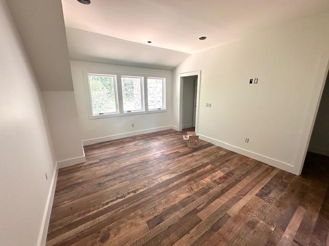 298 Pine Forest Rd, Sapphire, NC 28774 - empty room featuring lofted ceiling and dark wood-type flooring