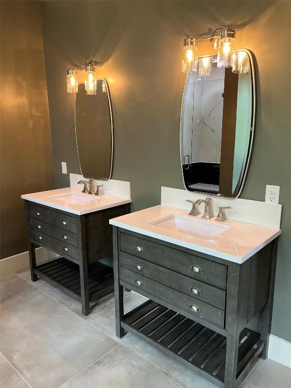 343 Ledgeview Rd, Cashiers, NC 28717 - full bathroom with two vanities and baseboards