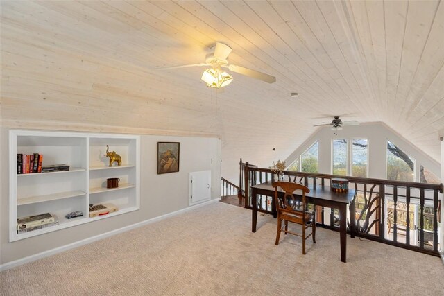 interior space with carpet flooring, ceiling fan, built in shelves, and wood ceiling
