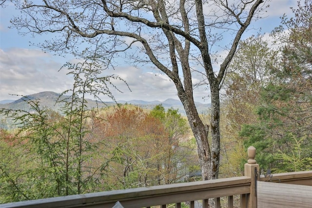 wooden deck featuring an outdoor fire pit