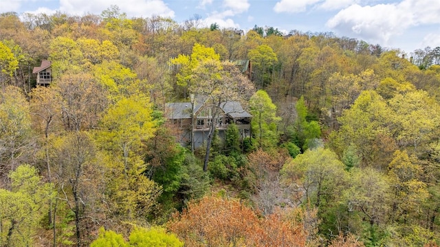 aerial view with a wooded view