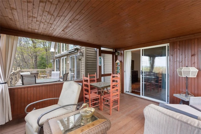 sunroom with plenty of natural light