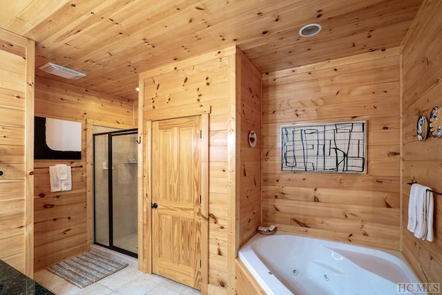 bathroom with tile patterned flooring, shower with separate bathtub, wood ceiling, and wooden walls