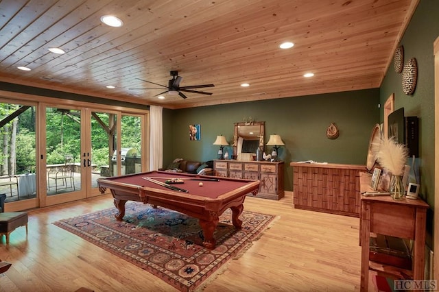 playroom featuring light hardwood / wood-style flooring, wooden ceiling, and french doors