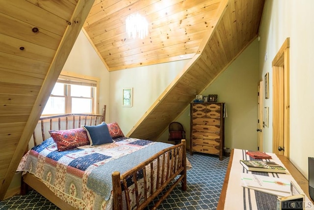 carpeted bedroom featuring vaulted ceiling and wooden ceiling