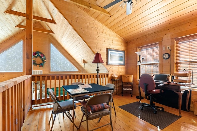 office space with vaulted ceiling, ceiling fan, wood ceiling, and light hardwood / wood-style flooring