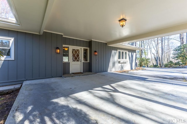 doorway to property with a patio