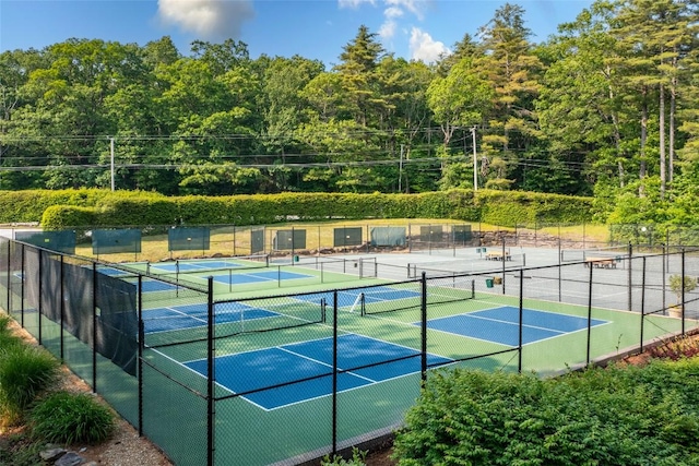 view of sport court with fence