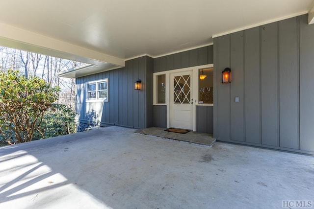 doorway to property with a patio