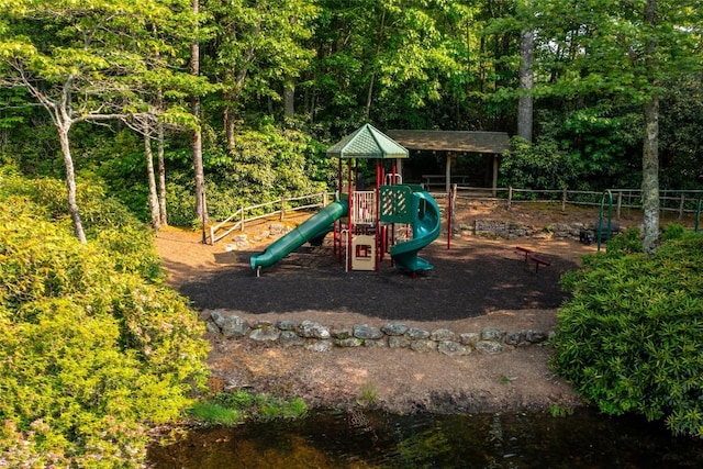 communal playground featuring fence