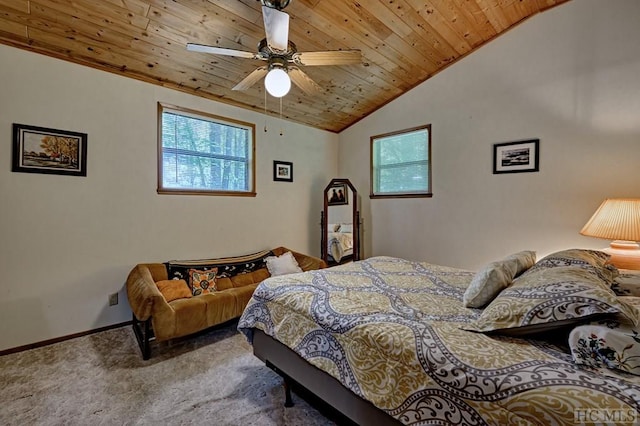 carpeted bedroom featuring ceiling fan, lofted ceiling, and wooden ceiling