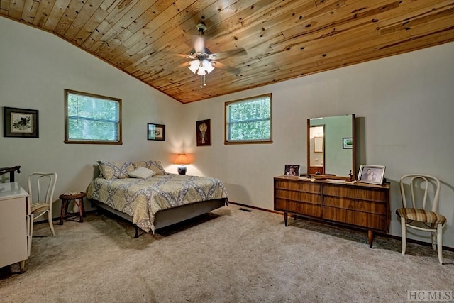 bedroom with lofted ceiling, light carpet, wood ceiling, and ceiling fan