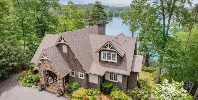 421 Easter Ln, Cullowhee, NC 28723 - view of front of home featuring a chimney, a view of trees, a water view, and roof with shingles