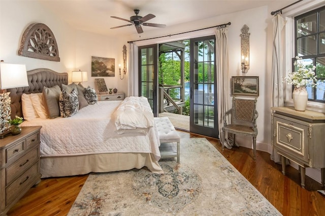 421 Easter Ln, Cullowhee, NC 28723 - bedroom with access to exterior, dark wood-type flooring, and ceiling fan