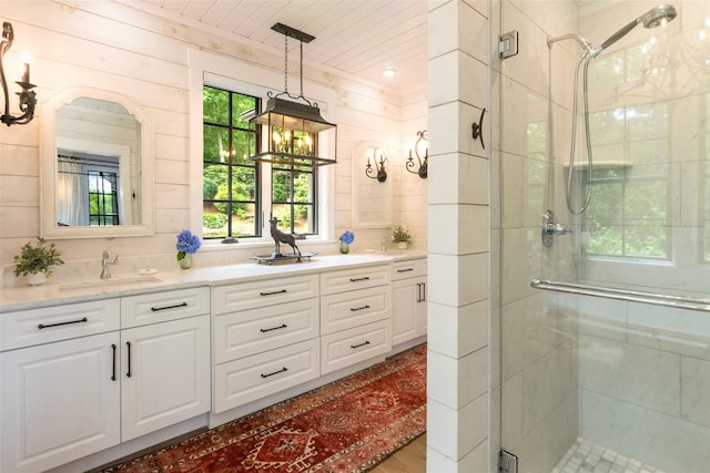 421 Easter Ln, Cullowhee, NC 28723 - full bathroom featuring double vanity and a stall shower
