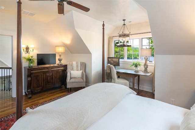 421 Easter Ln, Cullowhee, NC 28723 - bedroom featuring wood finished floors and a chandelier
