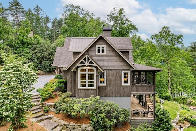 421 Easter Ln, Cullowhee, NC 28723 - back of house featuring a sunroom, a chimney, and stairs