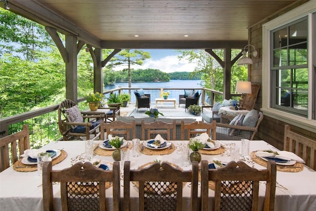 421 Easter Ln, Cullowhee, NC 28723 - wooden deck with outdoor dining space, an outdoor living space, and a water view