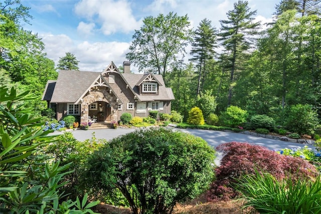 421 Easter Ln, Cullowhee, NC 28723 - tudor home with stone siding and a chimney