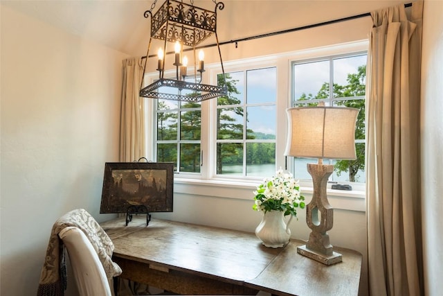 421 Easter Ln, Cullowhee, NC 28723 - dining space with healthy amount of natural light, a chandelier, and lofted ceiling