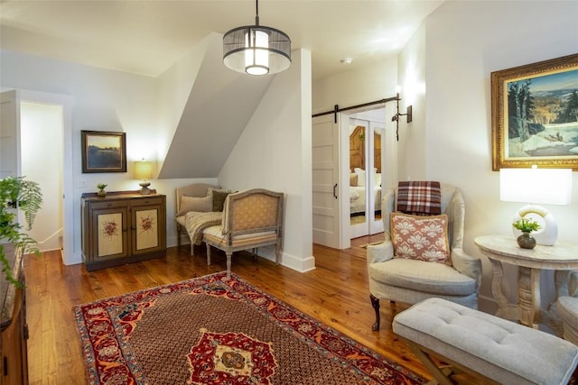 421 Easter Ln, Cullowhee, NC 28723 - living area with wood finished floors and a barn door