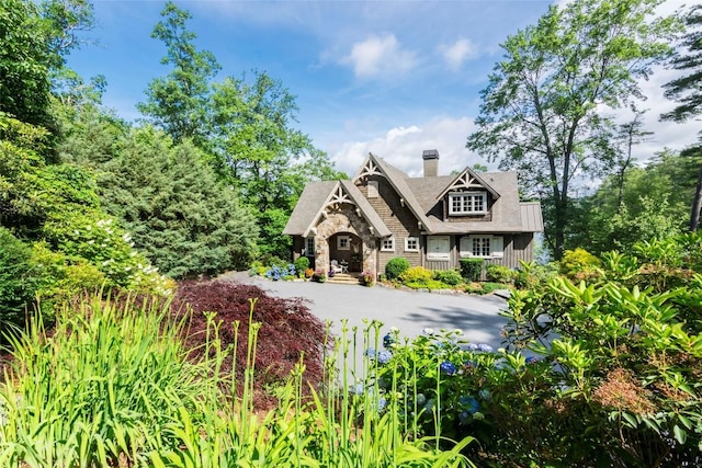 421 Easter Ln, Cullowhee, NC 28723 - view of front facade featuring a chimney and stone siding