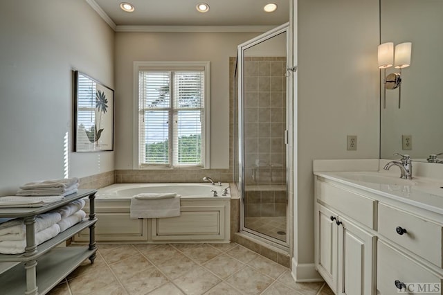 bathroom featuring ornamental molding, vanity, shower with separate bathtub, and tile patterned floors