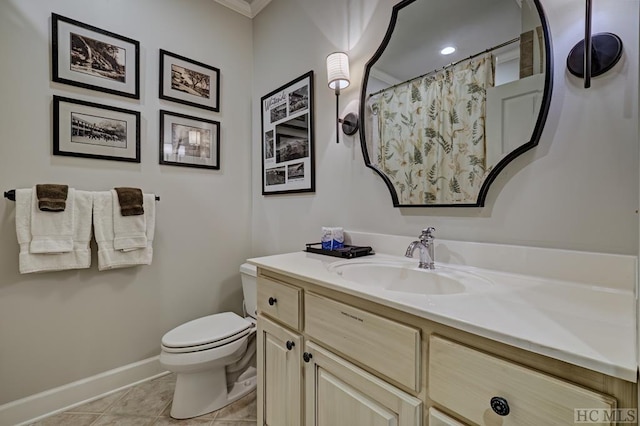 bathroom featuring a shower with shower curtain, vanity, tile patterned flooring, and toilet