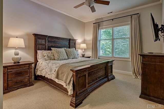 bedroom featuring ornamental molding, light carpet, and ceiling fan