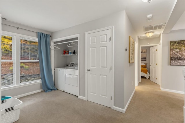 110 Kestrel Ct, Sapphire, NC 28774 - laundry area featuring light colored carpet, baseboards, and washer and clothes dryer