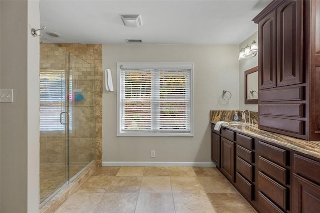 110 Kestrel Ct, Sapphire, NC 28774 - bathroom with vanity, baseboards, a shower stall, and tile patterned floors