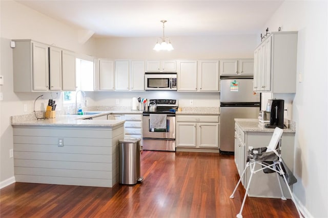 110 Kestrel Ct, Sapphire, NC 28774 - kitchen featuring stainless steel appliances, a peninsula, and dark wood-style flooring