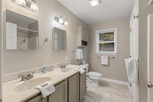 110 Kestrel Ct, Sapphire, NC 28774 - bathroom with toilet, double vanity, marble look tiles, a shower, and baseboards