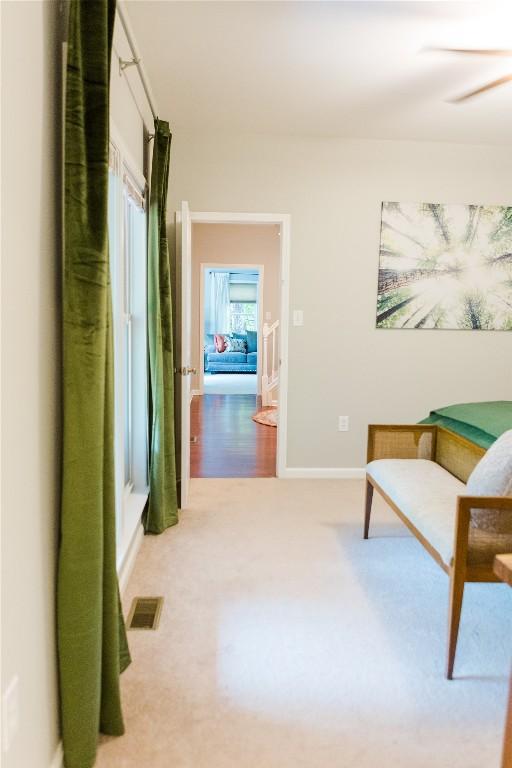 110 Kestrel Ct, Sapphire, NC 28774 - sitting room with carpet floors, baseboards, and a ceiling fan
