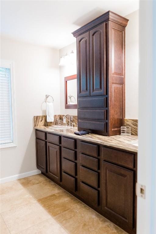110 Kestrel Ct, Sapphire, NC 28774 - bathroom with vanity, baseboards, and tile patterned flooring