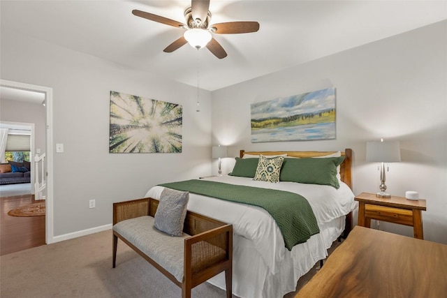110 Kestrel Ct, Sapphire, NC 28774 - carpeted bedroom with baseboards and a ceiling fan