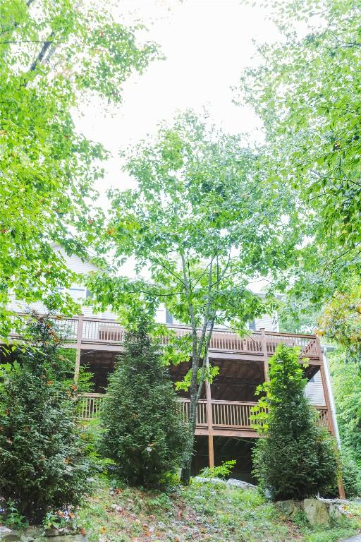 110 Kestrel Ct, Sapphire, NC 28774 - view of yard with a wooden deck