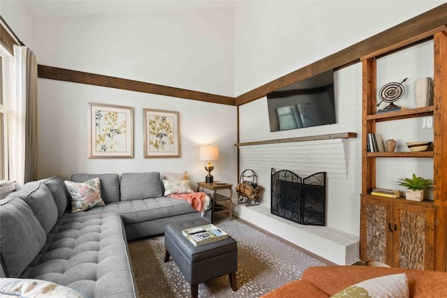 38 Lonely Mountain Dr Unit 24C, Sapphire, NC 28774 - living room featuring a brick fireplace