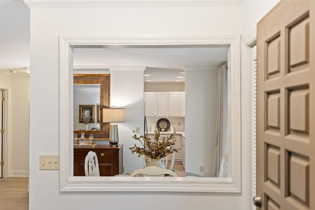 details featuring ornamental molding, recessed lighting, and wood finished floors