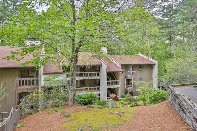 back of property featuring a chimney