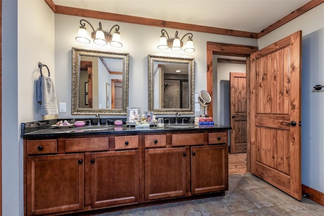 full bathroom featuring double vanity and a sink