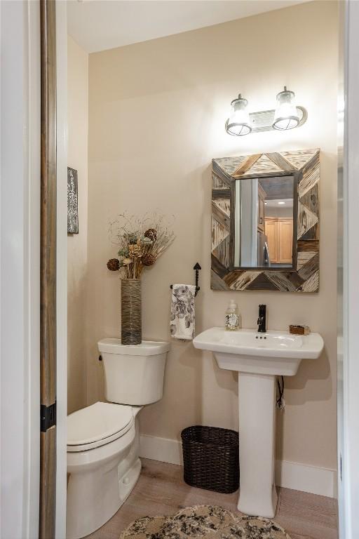 194 Redrock Trl, Glenville, NC 28736 - half bathroom with toilet and baseboards