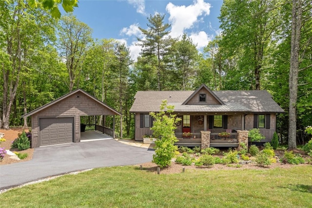 194 Redrock Trl, Glenville, NC 28736 - view of front of house featuring a porch, aphalt driveway, and a front yard
