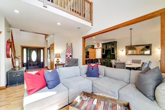living room featuring light wood-style floors and recessed lighting