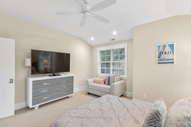 bedroom featuring ceiling fan, lofted ceiling, and light carpet