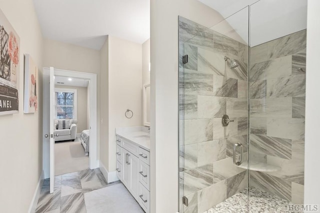 bathroom featuring vanity, vaulted ceiling, and walk in shower