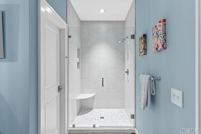 bathroom featuring walk in shower